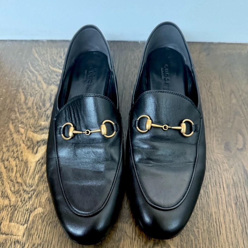 Gucci Jordaan Black Leather Loafers with Gold Detailing